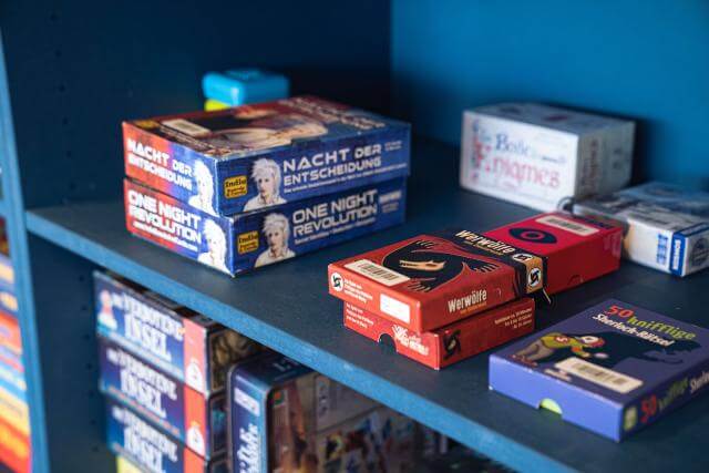 boardgames in a cupboard