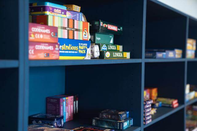 boardgames in a cupboard