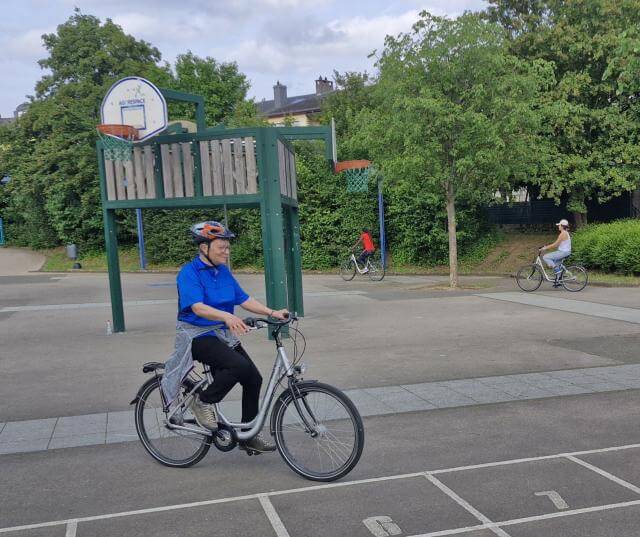 A person on a bicycle.